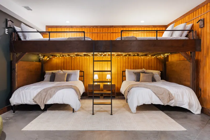 Lower level bunk room with four queen beds